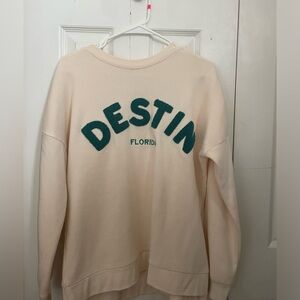 Destin Florida cream small crewneck. Puffy teal blue lettering